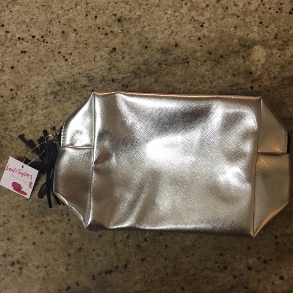NWT silver metallic make up bag